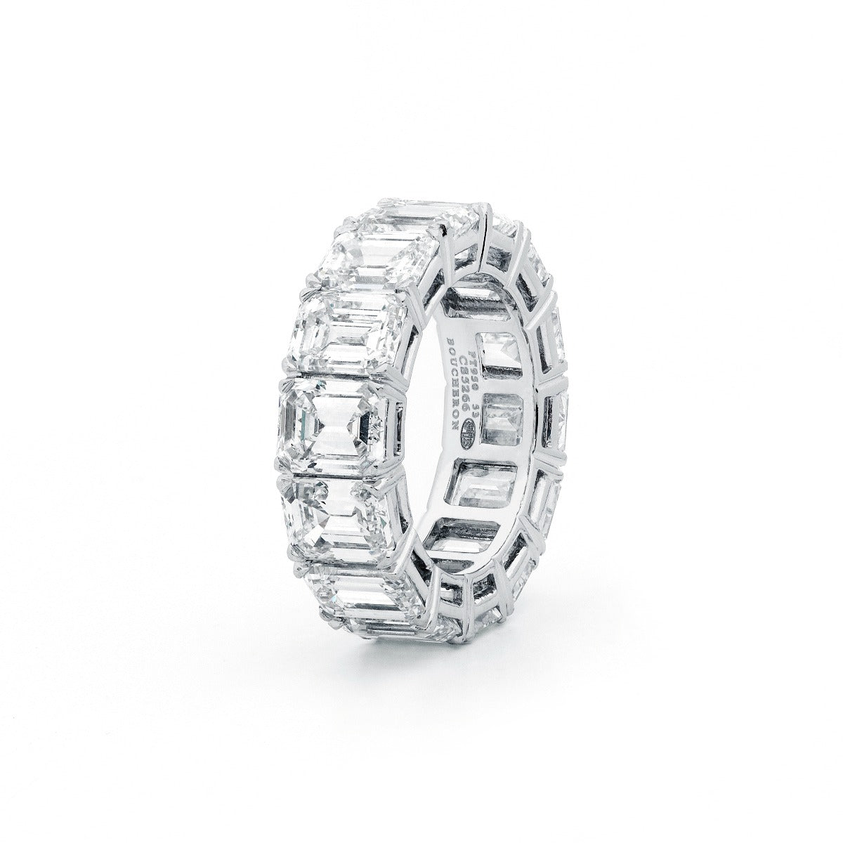 Elegant Boucheron Eternity Ring featuring a continuous row of sparkling gemstones on a sleek gold band.